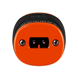 Close-up of an orange and black cylindrical object on a white background