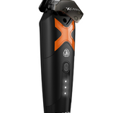 Black and orange grooming tool with brand logo on a white background