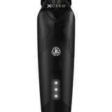 Black grooming tool with 'Xceed' branding on a white background