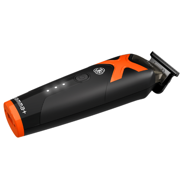 Black and orange hair trimmer on a white background