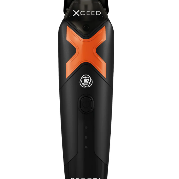 Black and orange grooming tool with 'Xceed' branding on a white background